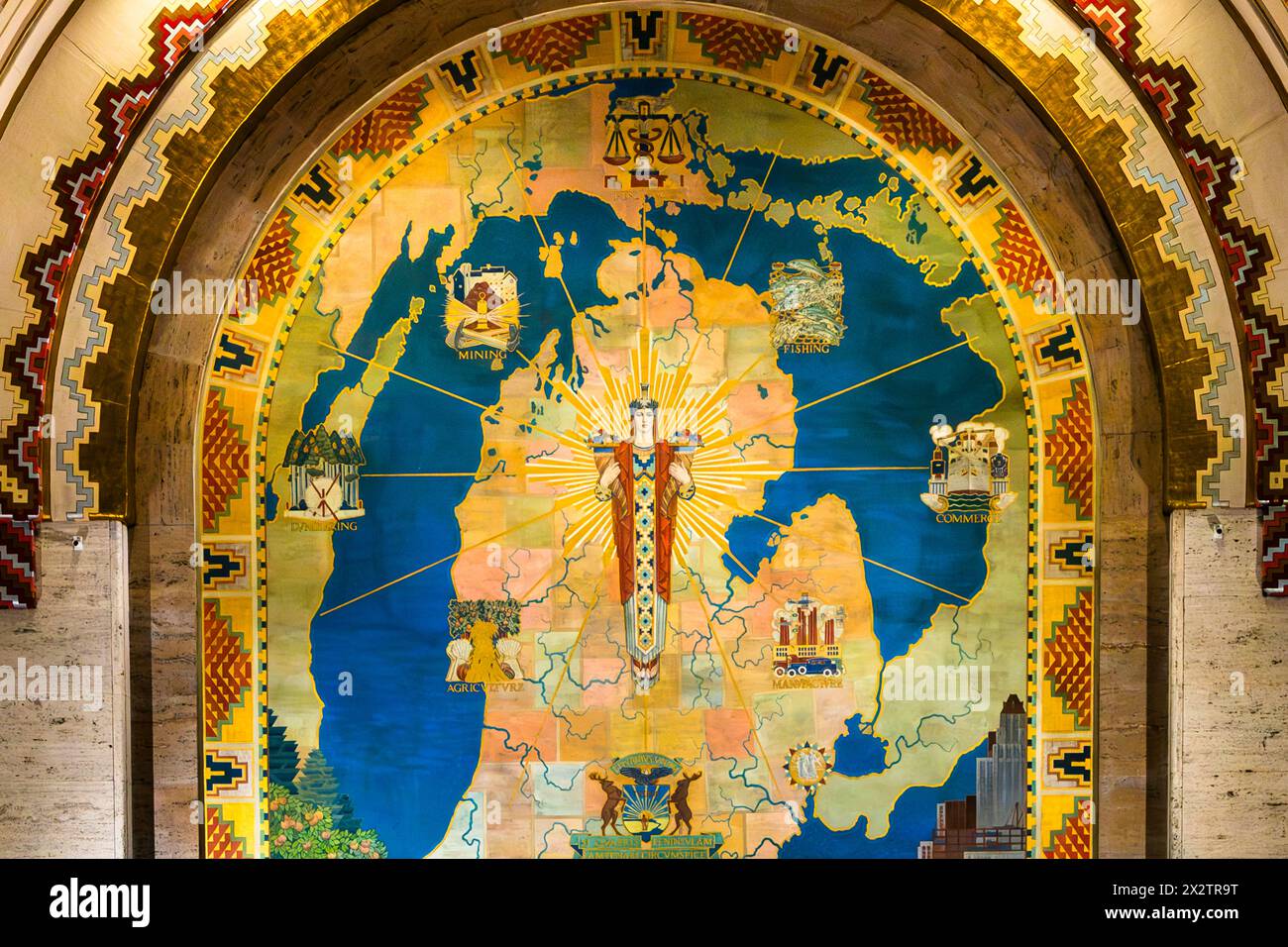 The large mural in the banking hall of the Guardian Building in Detroit depicts the state of Michigan and its industries, painted by American artist Ezra Augustus Winter. The state motto is the Latin saying: Si quaeris peninsulam amoenam, circumspice (If you are looking for a lovely peninsula, look around you). Greektown, Detroit, Michigan, United States Stock Photo