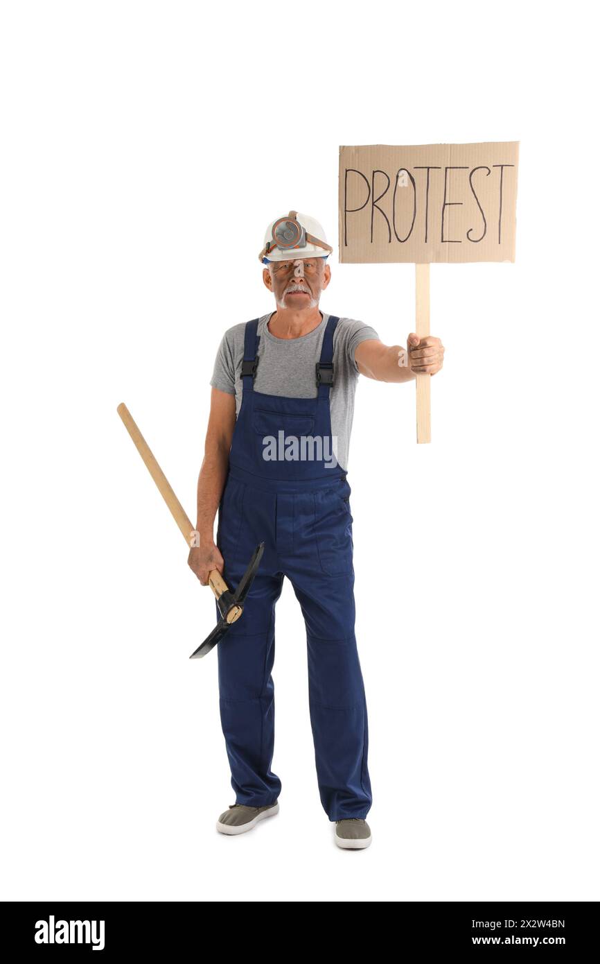 Protesting miner man with pick axe and placard on white background Stock Photo