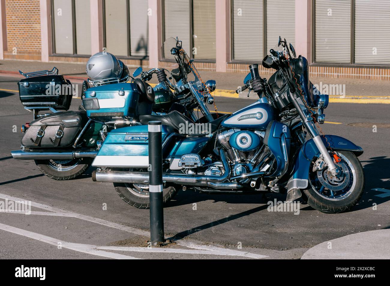 Victoria, Canada Mar 17 2024 Two parked Harley Davidson motorcycles
