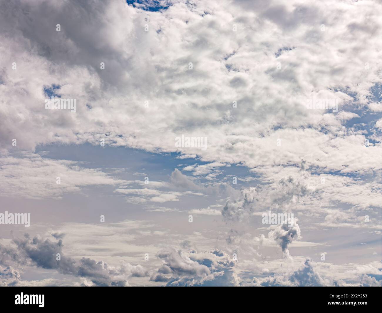 Blue sky with white clouds during the day Stock Photo - Alamy