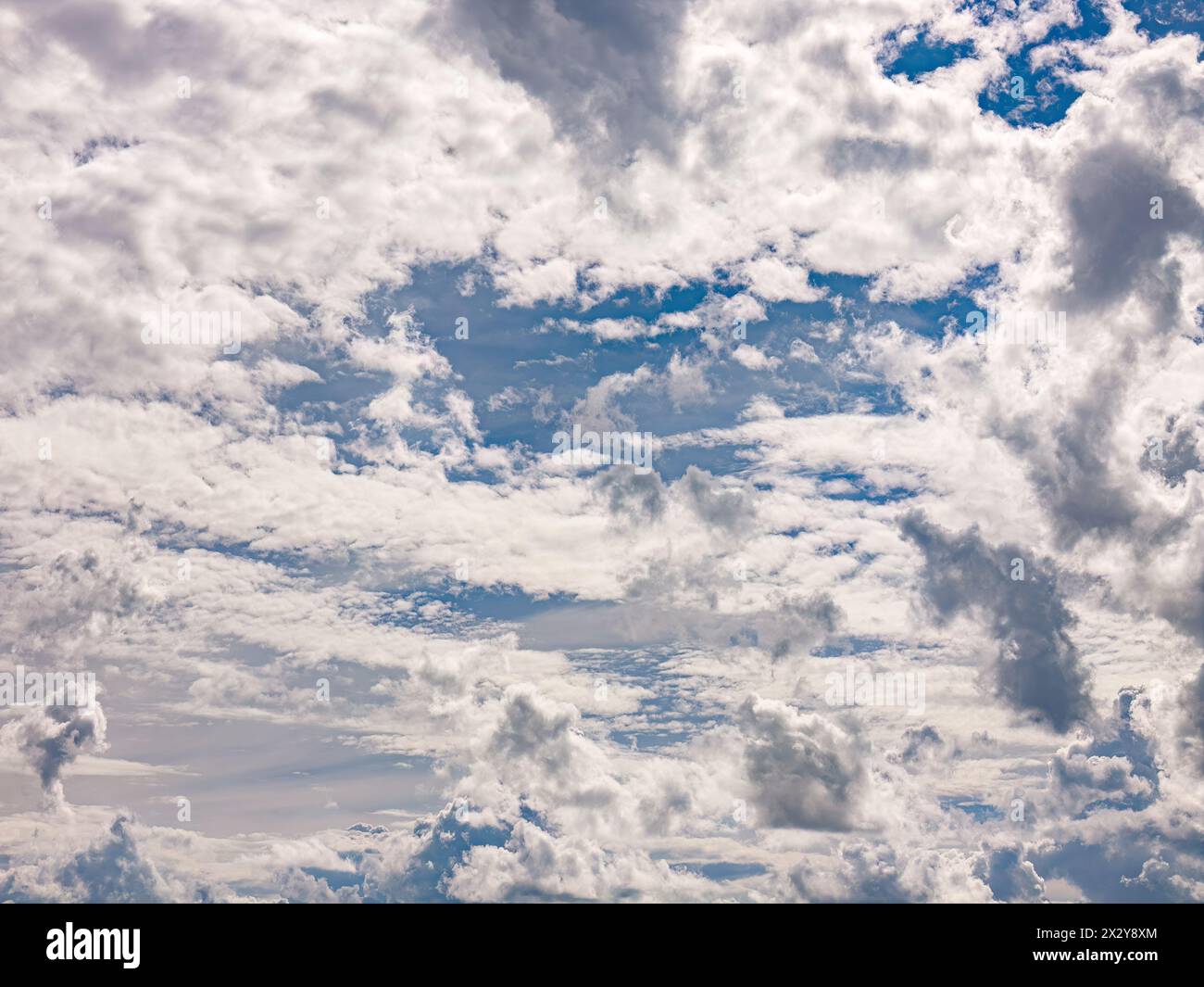 Blue sky with white clouds during the day Stock Photo - Alamy