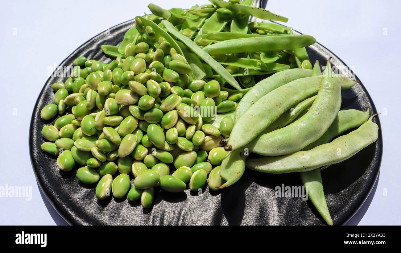 Indian green Flat beans vegetable known as Valor Papdi, whole and seeds