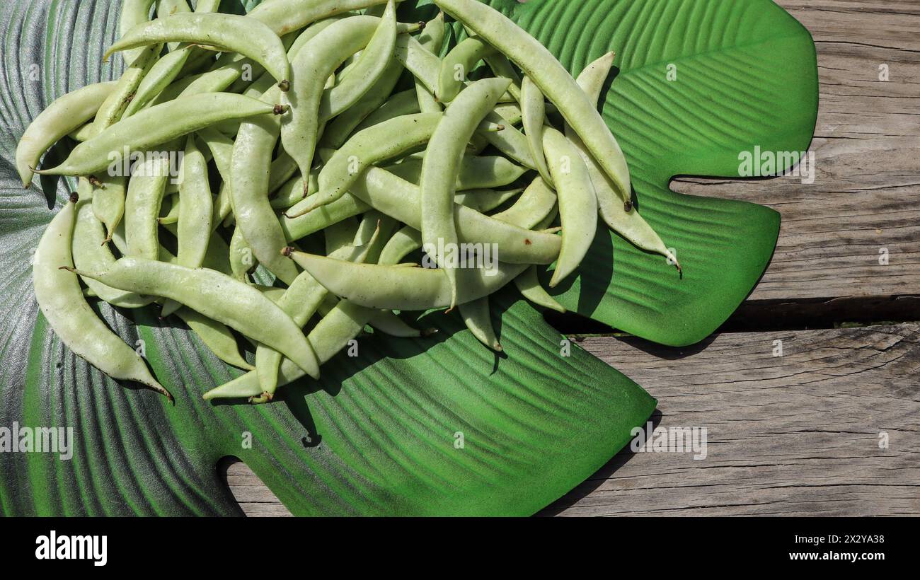 Indian green Flat beans vegetable known as Valor Papdi, whole and seeds