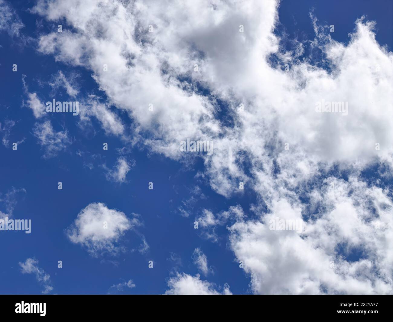 Blue sky with white clouds during the day Stock Photo - Alamy