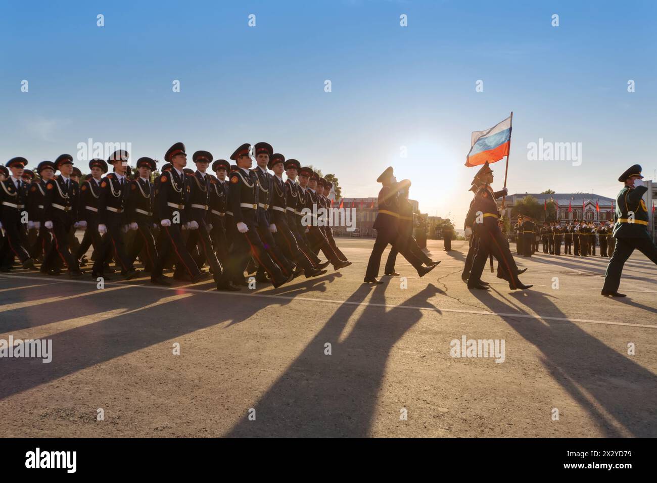 SAMARA - MAY 5: Soldiers with flag marching on parade rehearsal before the Day of Victory in the Great Patriotic War on May 5, 2012 in Samara, Russia. Stock Photo