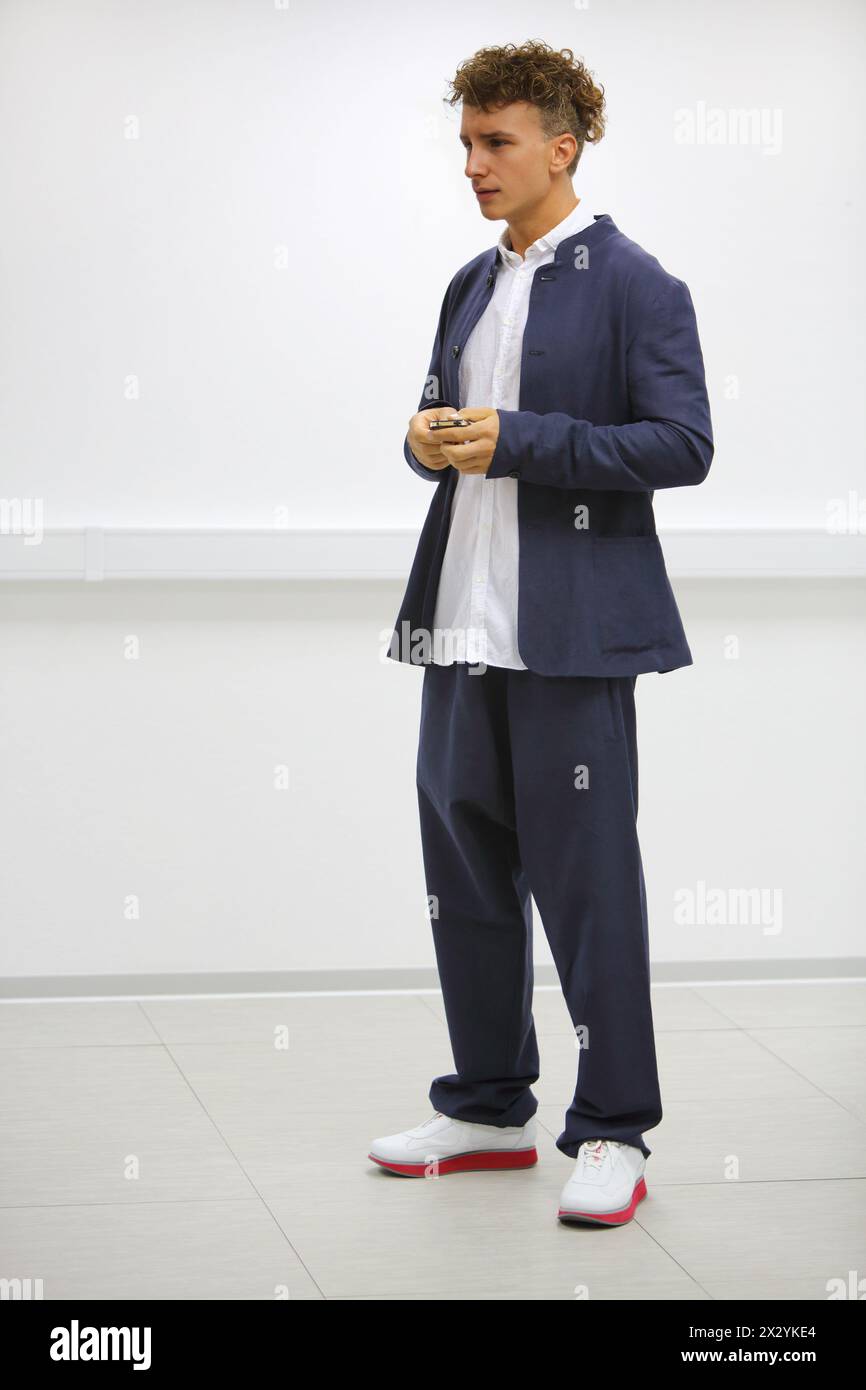 The man in the white suit film poster hi-res stock photography and ...