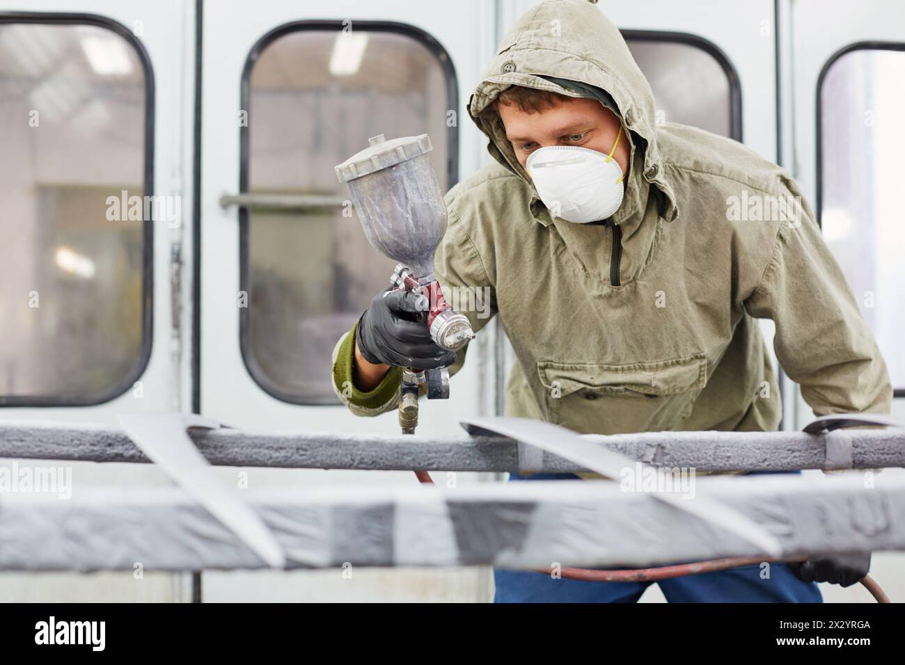 Spraying silver paint on round hi-res stock photography and images - Alamy