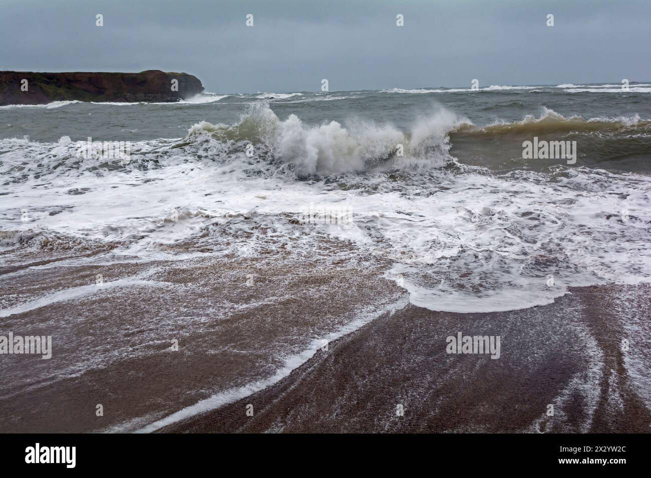 Waves on the beach, east coast of Scotland Stock Photo