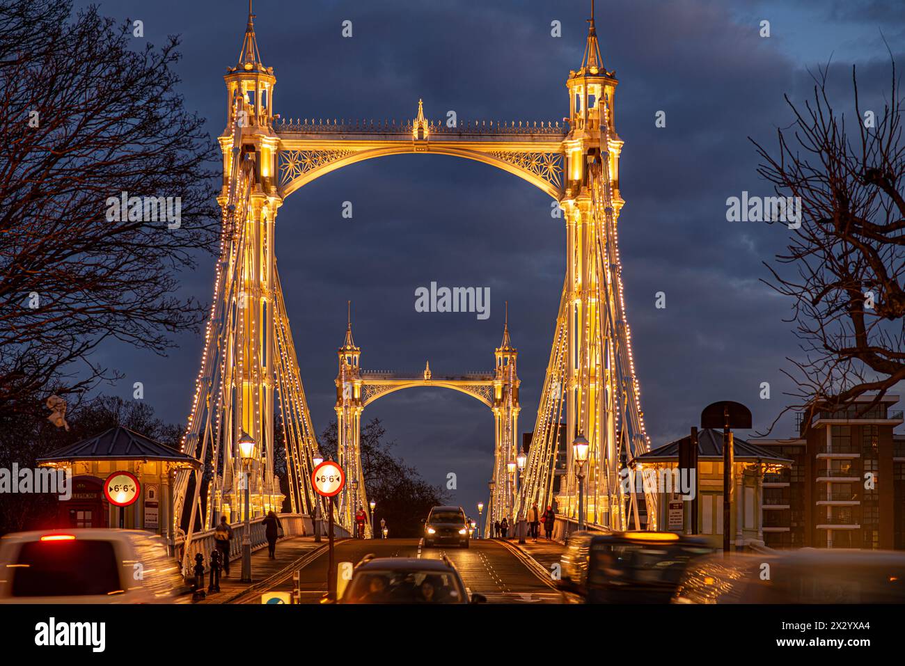 Albert Bridge is a road bridge over the River Thames connecting Chelsea in Central London on the north bank to Battersea on the south. Stock Photo