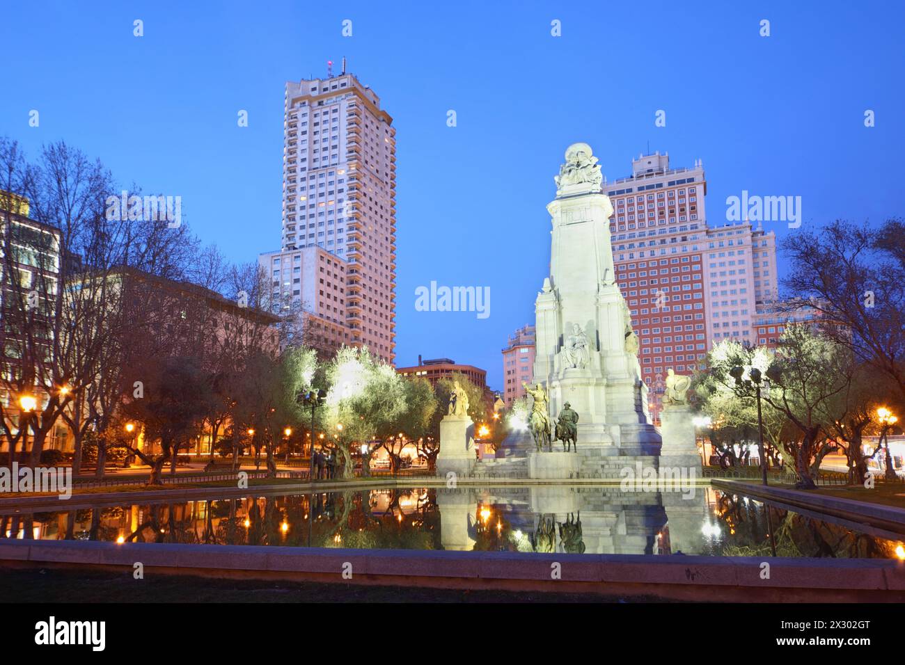 MADRID - MARCH 7: Monument to Cervantes at night, on March 7 2012 in Madrid, Spain. Spain is second largest in world by number of steps it has tourist Stock Photo