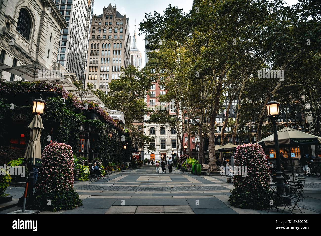 Bryant Park Terrace Garden seen from the Entrance at West 42nd Street - Manhattan, New York City Stock Photo
