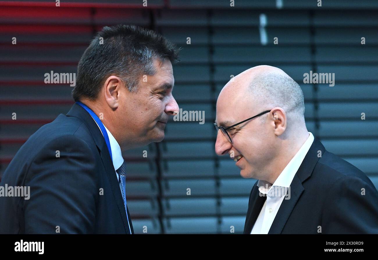 Berlin, Germany. 24th Apr, 2024. Alexander Borgschulze (l), ASW Board Member (Allianz für Sicherheit in der Wirtschaft e.V.), and Sinan Selen, BfV Vice President, at the security conference of the Federal Office for the Protection of the Constitution (BfV). The topic of the conference is 'China's ambitions in the world - effects on the security of German companies and politics'. Credit: Britta Pedersen/dpa/Alamy Live News Stock Photo