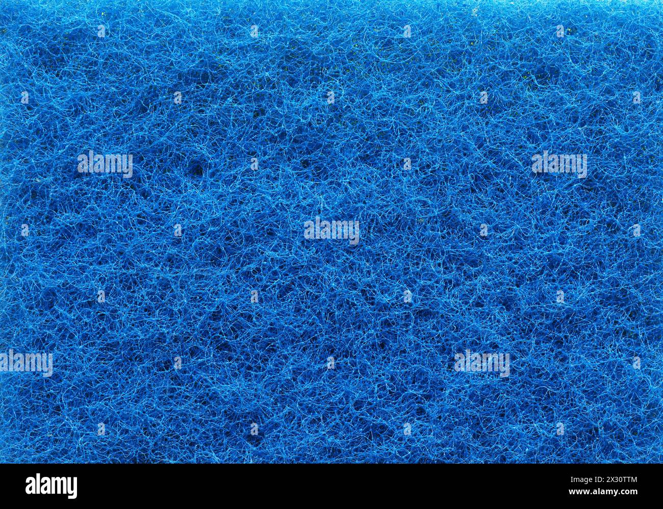 Texture of a blue plastic fiber sponge, environmentally harmful products concept  RECORD DATE NOT STATED Stock Photo