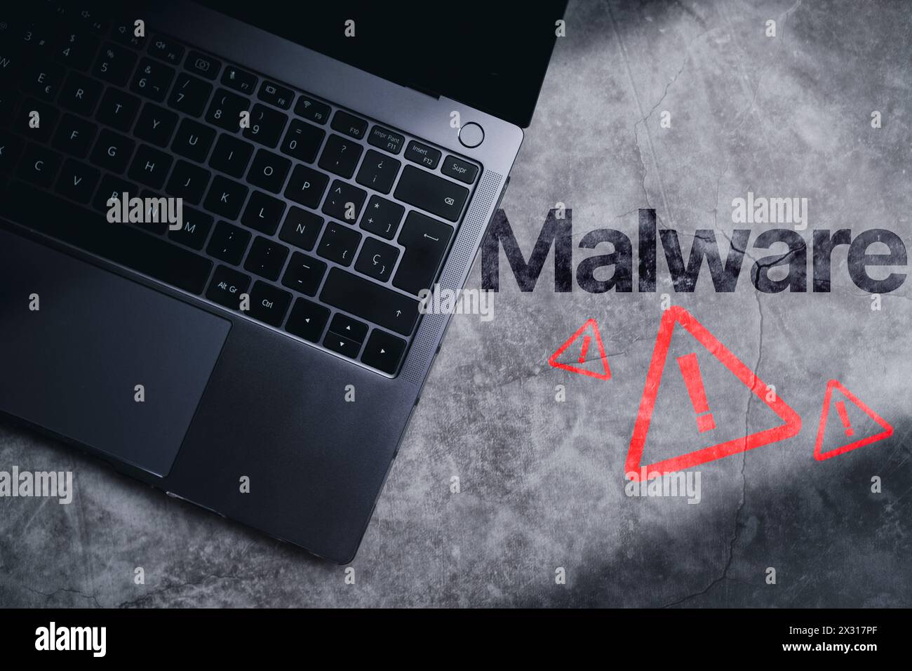 Top view photo of laptop on desk with malware alert. Compromised information concept. Internet virus cyber security and cybercrime. Stock Photo