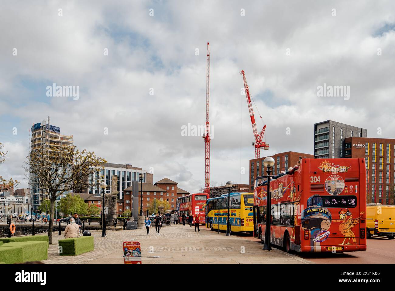 Liverpool, UK, April 11 2024 Colorful buses await passengers in the