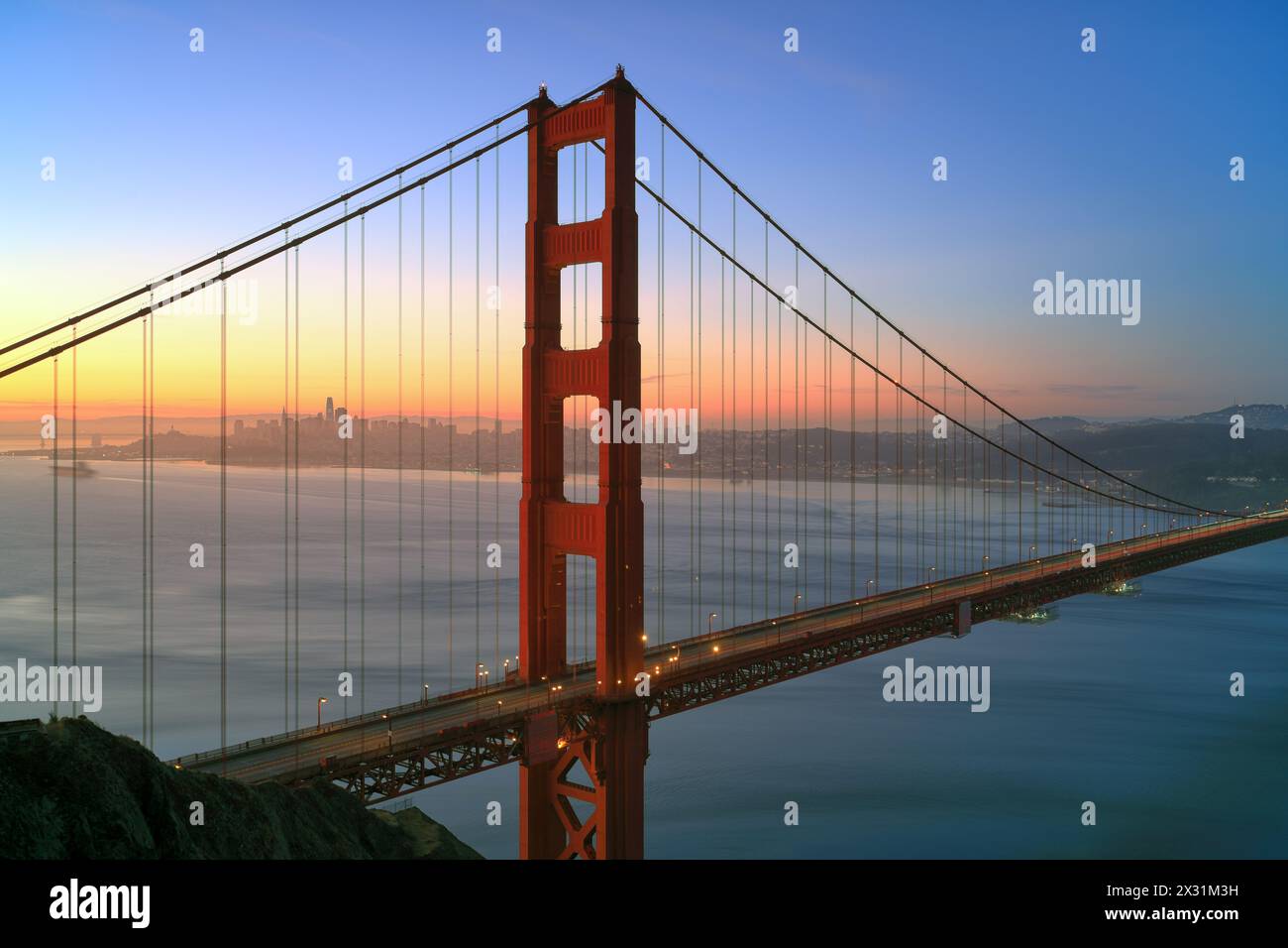 geography / travel, USA, California, San Francisco, Golden Gate Bridge and skyline, sunrise, ADDITIONAL-RIGHTS-CLEARANCE-INFO-NOT-AVAILABLE Stock Photo