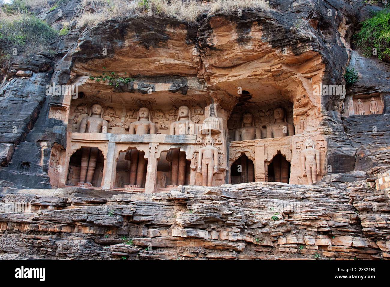 Jain sculptures carved along both the rock faces of the valley ...