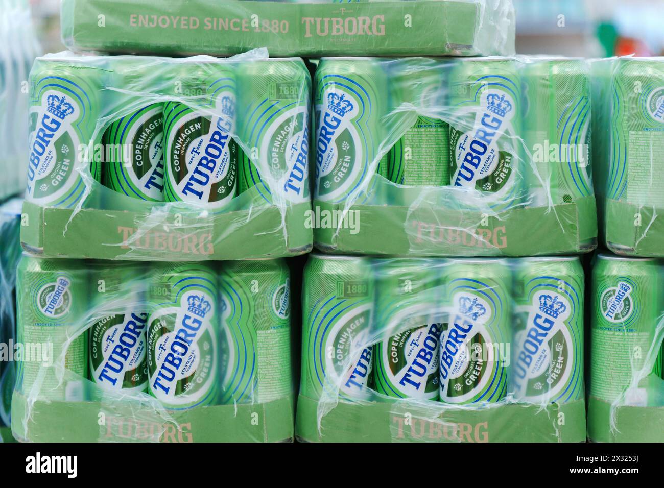 Tyumen, Russia-January 11, 2024: Tuborg alcoholic beer on the shelf in superstore. Canned alcoholic drinks Stock Photo