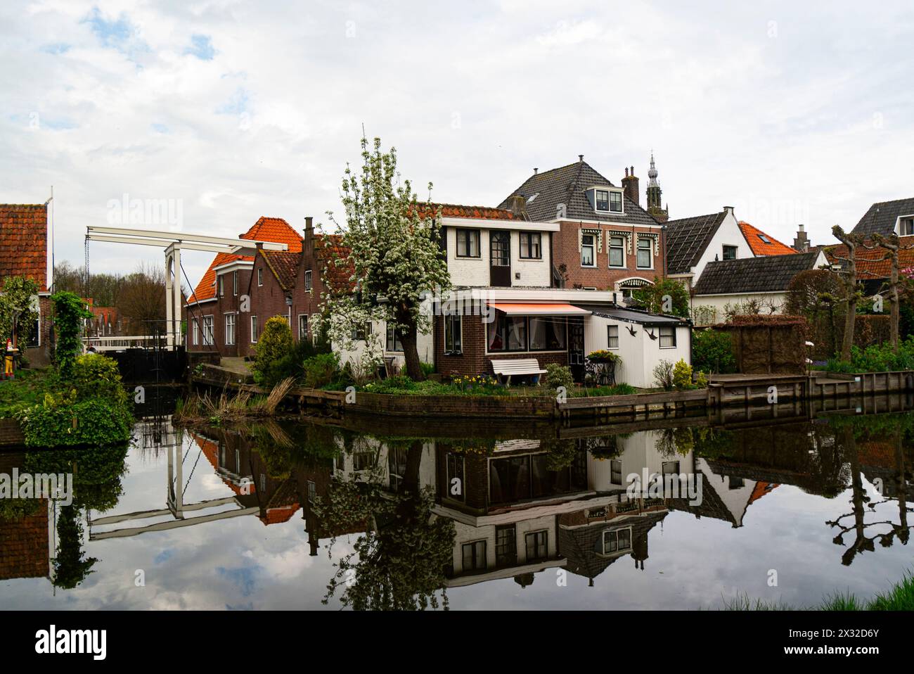 Lovely house on a canal in Edam town once a shipbuilding town world famous for its cheese located in the northern Dutch countryside near Amsterdam Stock Photo