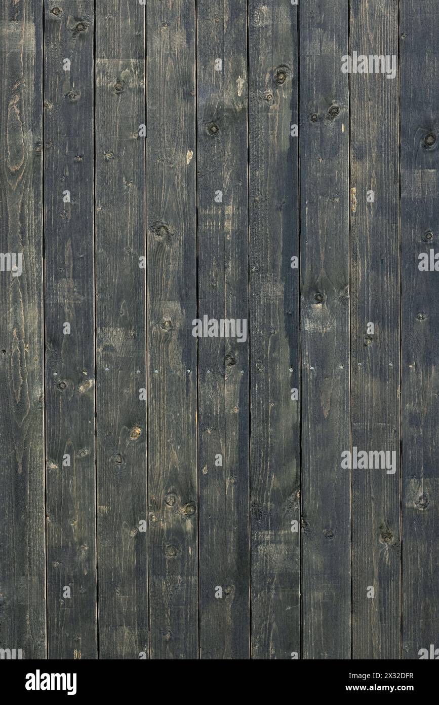 old dark painted wooden wall background Stock Photo