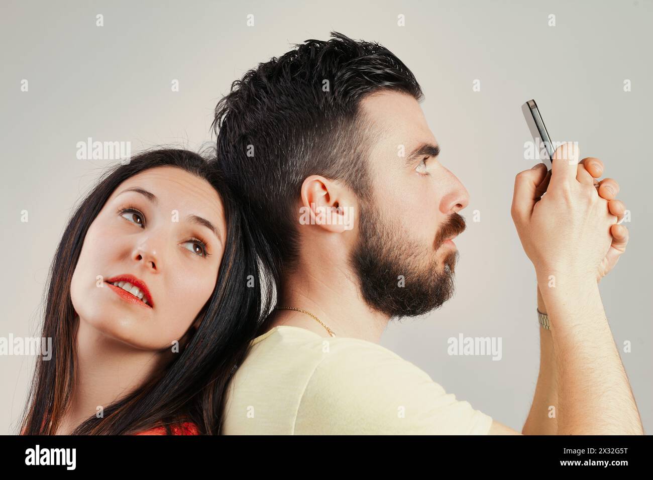 Preoccupied Images Woman longs for conversation; man preoccupied with his phone ...