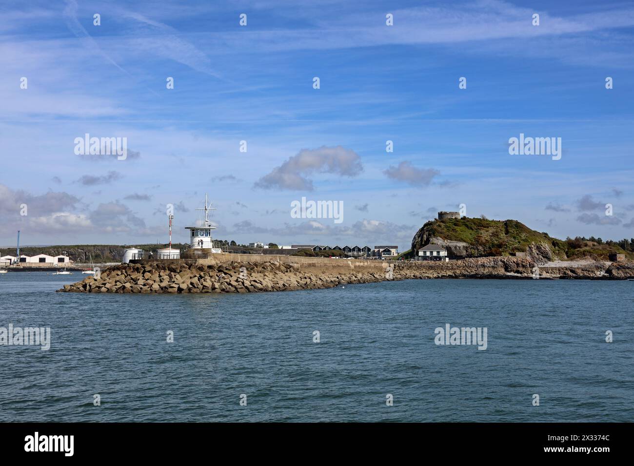 The historical Mount Batten Breakwater, in Plymouth Sound seen from sea level with the historic tower included. Header and copy space. Sunny. Stock Photo