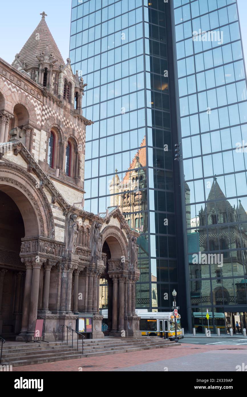 USA, BOSTON – 05 SEP, 2014: Trinity Church in Copley Square is reflecting on John Hancock Tower. Stock Photo