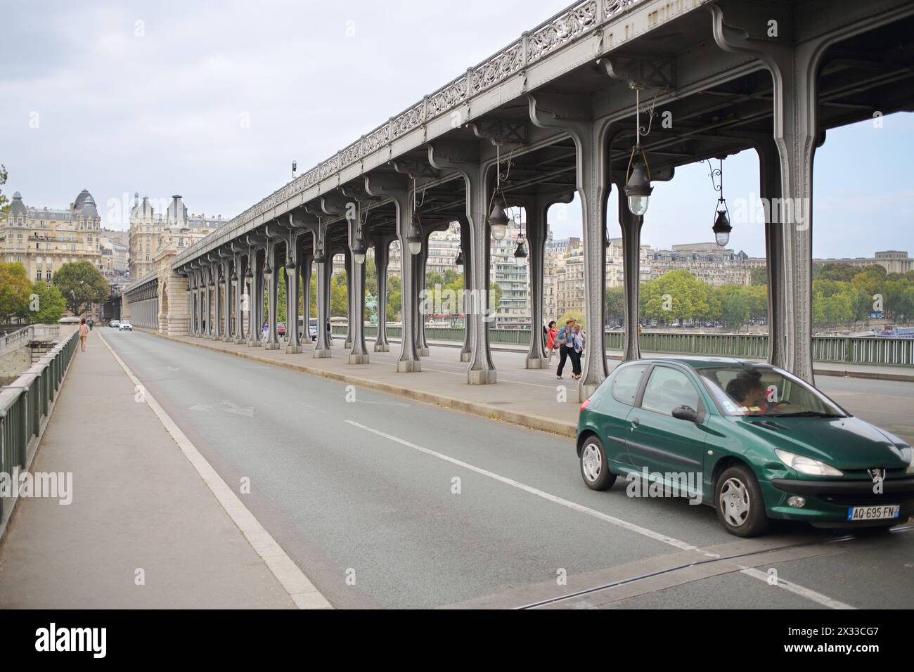 PARIS, FRANCE - SEP 11, 2014: Bir-Hakeim Bridge is the unique two-tiered bridge. Top level for subway trains and the bottom is for cars and pedestrian Stock Photo