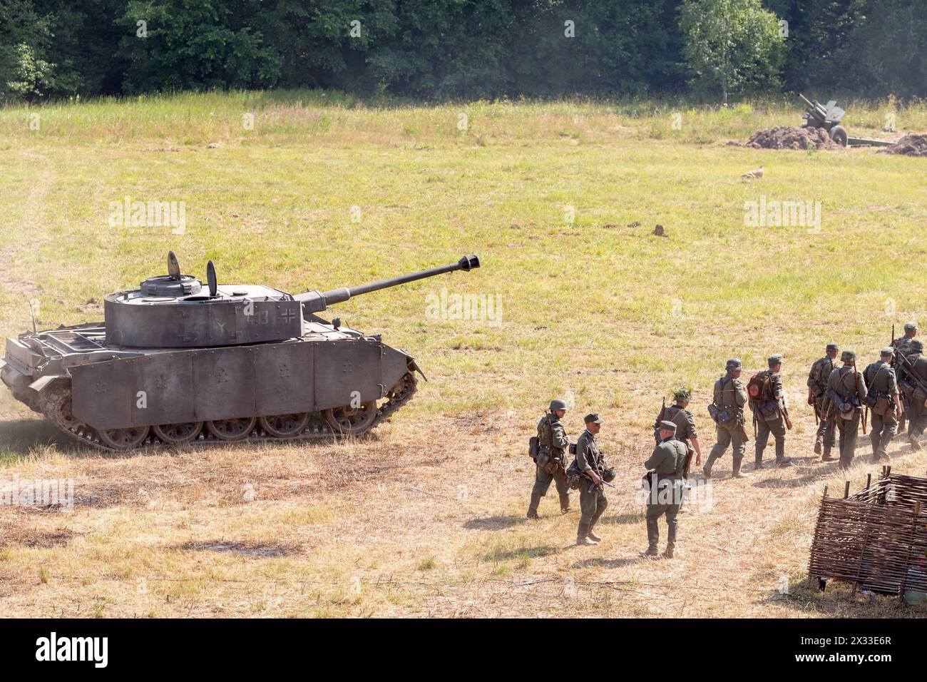 NELIDOVO, RUSSIA- JULY 12, 2014: Battlefield 2014: Nazi tank and infantry unit Stock Photo