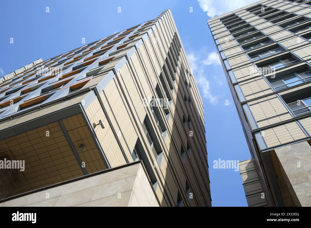 MOSCOW - MAY 24, 2014: The distance between the two facades of modern high-rise buildings residential complex Seventh Heaven, bottom view Stock Photo