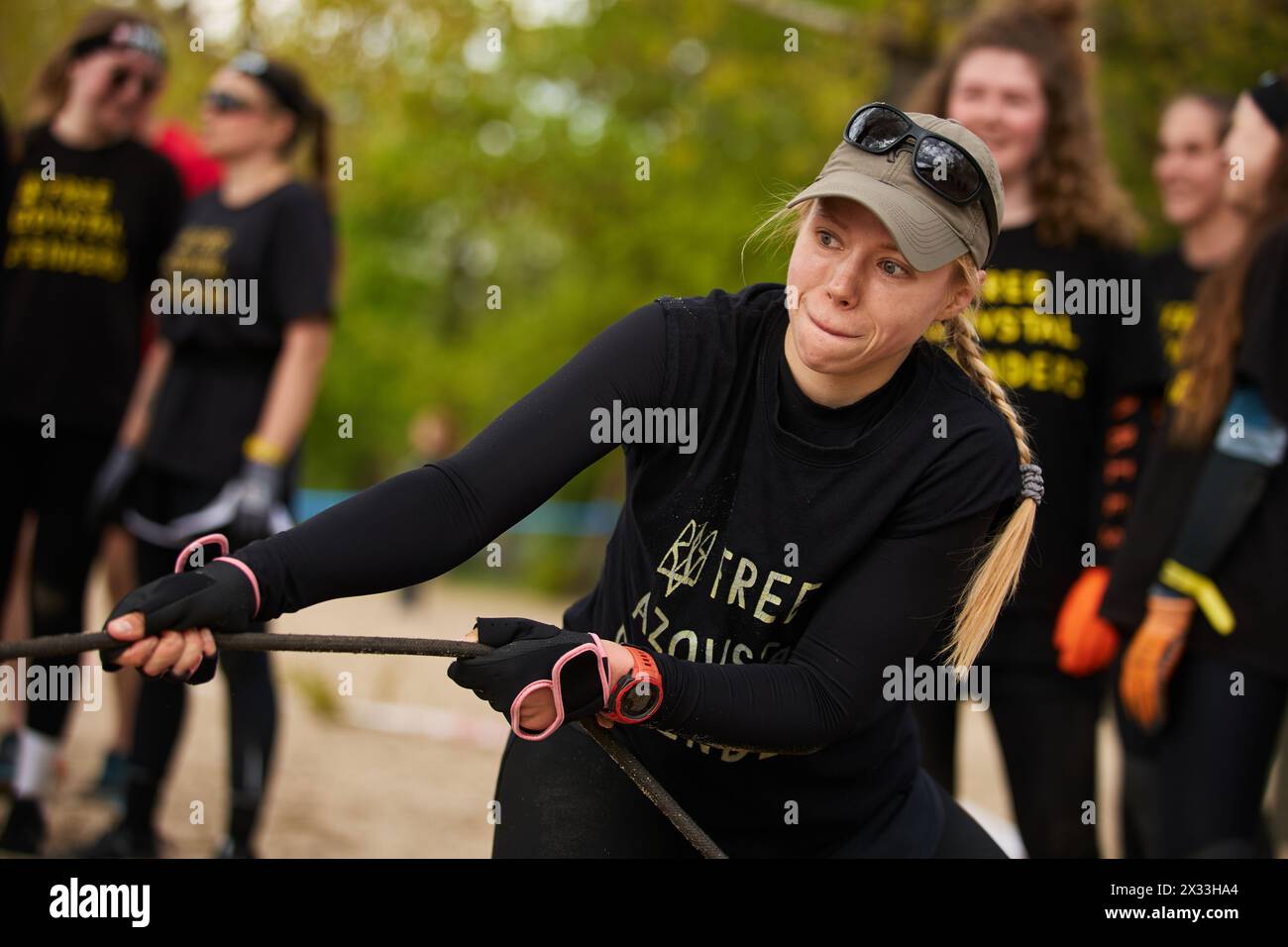 Ukrainian female pulling the plate drag at the Spartan Race competition