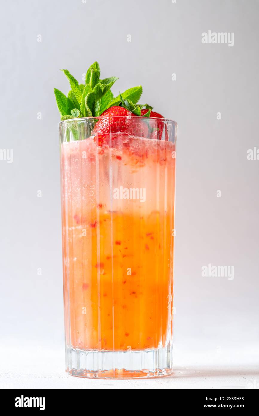 Glass of Courtside cocktail garnished with mint sprigs Stock Photo