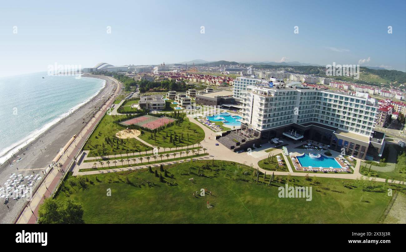 RUSSIA, ADLER - JUL 25, 2014: Sea beach near territory of hotel ...
