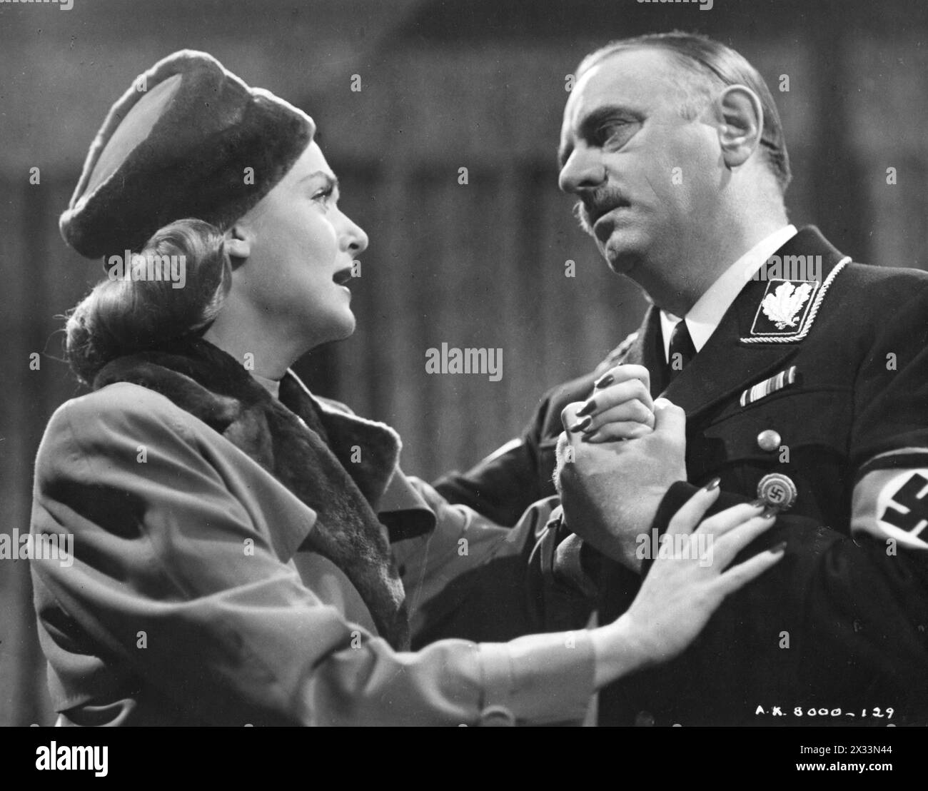 CAROLE LOMBARD and SIG RUMAN in a scene from TO BE OR NOT TO BE 1942 Produced and Directed by ERNST LUBITSCH Story MELCHIOR LENGYEL Screenplay EDWIN JUSTUS MEYER Costume Design IRENE  (for Carole Lombard) Cinematographer RUDOLPH MATE Production Design VINCENT KORDA  Music WERNER R HEYMANN  Photograph by COBURN  Presented by ALEXANDER KORDA  United Artists Stock Photo
