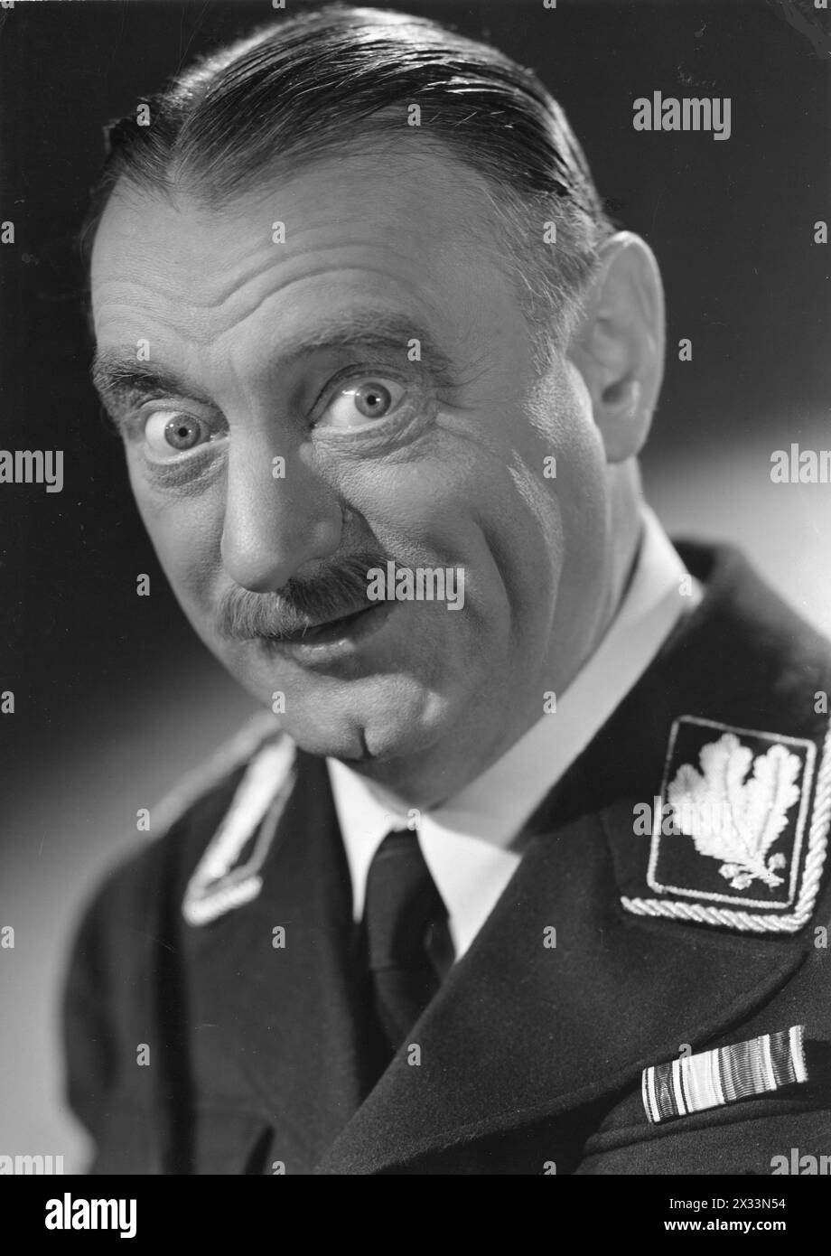 German character actor SIG RUMAN in a publicity portrait as Colonel Ehrhardt from TO BE OR NOT TO BE 1942 Produced and Directed by ERNST LUBITSCH Story MELCHIOR LENGYEL Screenplay EDWIN JUSTUS MEYER Costume Design IRENE  (for Carole Lombard) Cinematographer RUDOLPH MATE Production Design VINCENT KORDA  Music WERNER R HEYMANN  Photograph by COBURN  Presented by ALEXANDER KORDA  United Artists Stock Photo