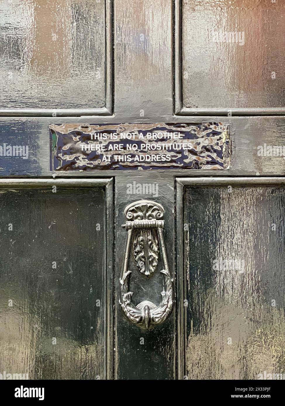 this is not a brothel there are no prostitutes at this address sign on house in meard street soho central london W1 england uk Stock Photo