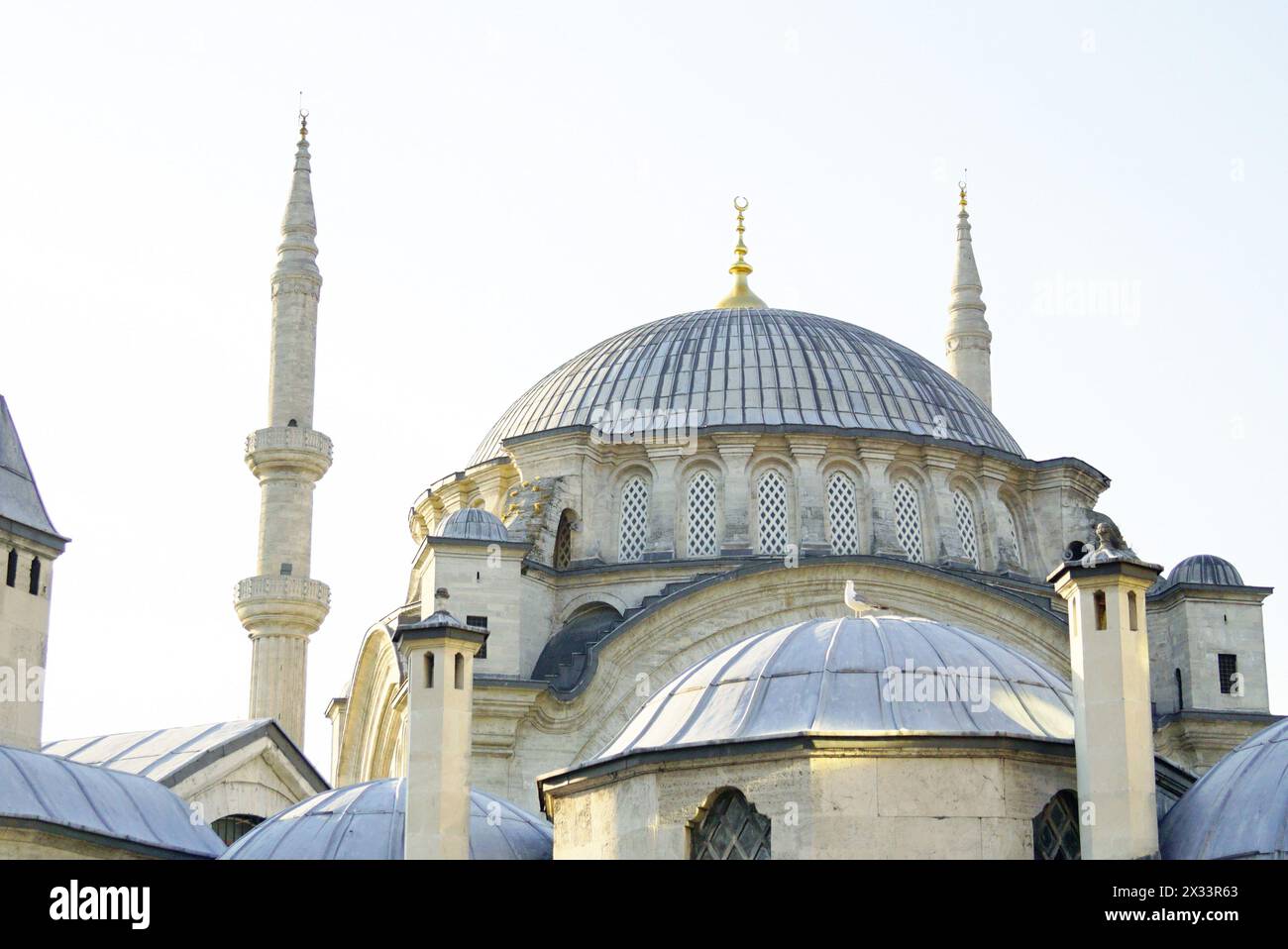 Domes and minarets of the Sultan's Nuruosmaniye Mosque, built near the Grand Bazaar in Istanbul, Turkey Stock Photo