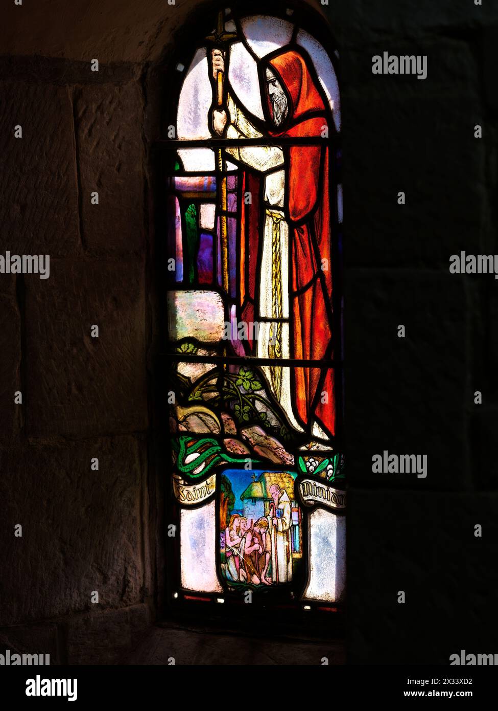 Saint Ninian, illustrated stained glass window, St Margaret's chapel (the oldest building in Edinburgh), Edinburgh castle, Scotland. Stock Photo