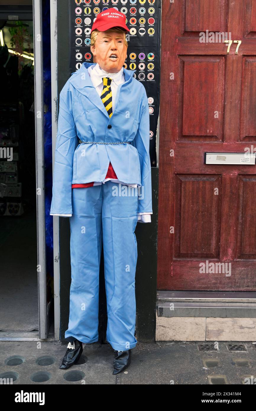 Donald Trump effigy mannikin mannequin outside costume mask portrait joke shop store in Soho London England UK KATHY DEWITT Stock Photo