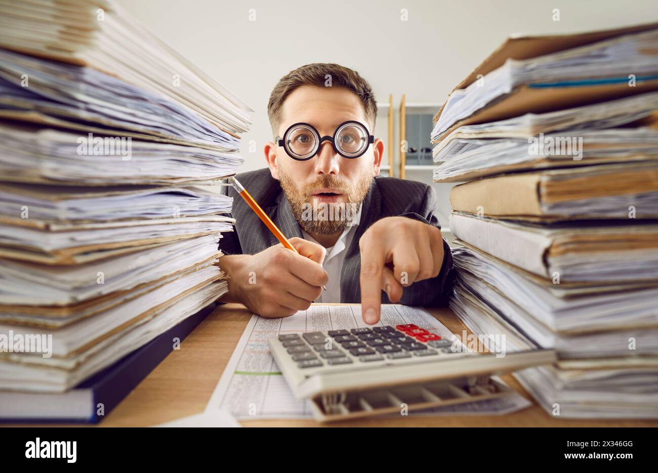 Businessman looking stack folders hi-res stock photography and images ...
