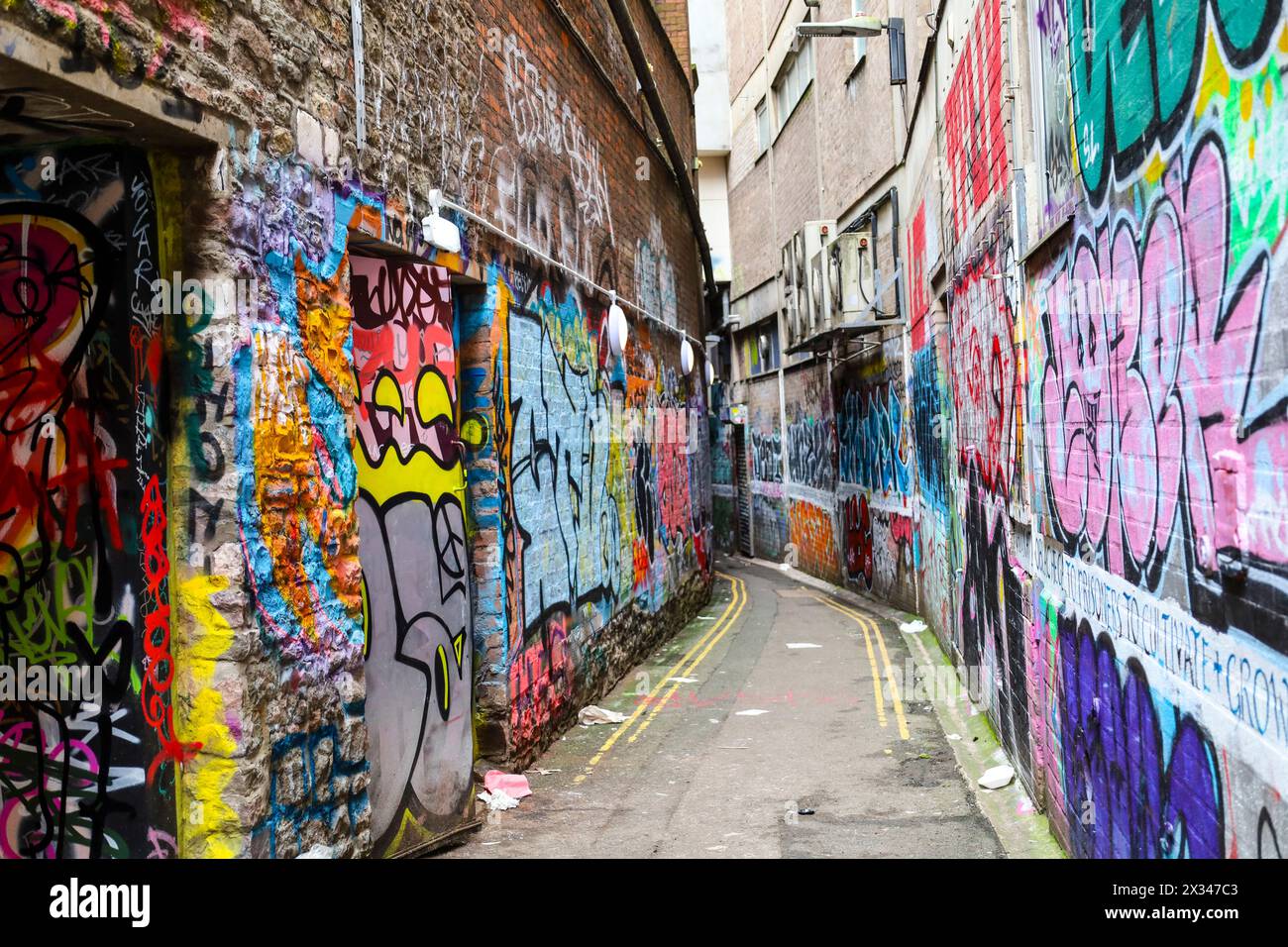 Bristol, England- March 30, 2024: Famous street called Leonard Lane full of graffiti's in Bristol city Stock Photo