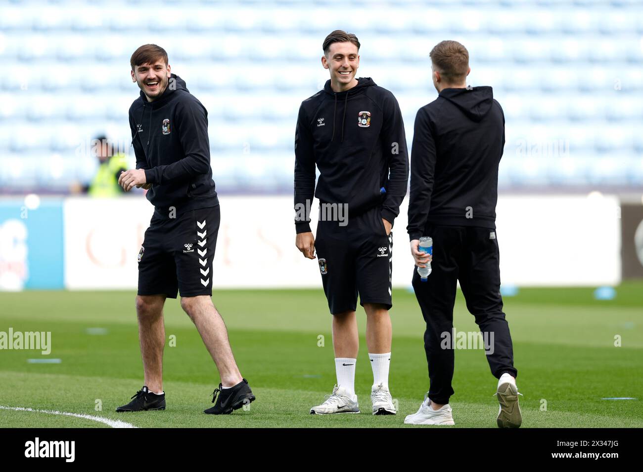 Coventry City's Luis Binks (centre) and team-mates inspect the pitch ahead of the Sky Bet Championship match at Coventry Building Society Arena, Coventry. Picture date: Wednesday April 24, 2024. Stock Photo