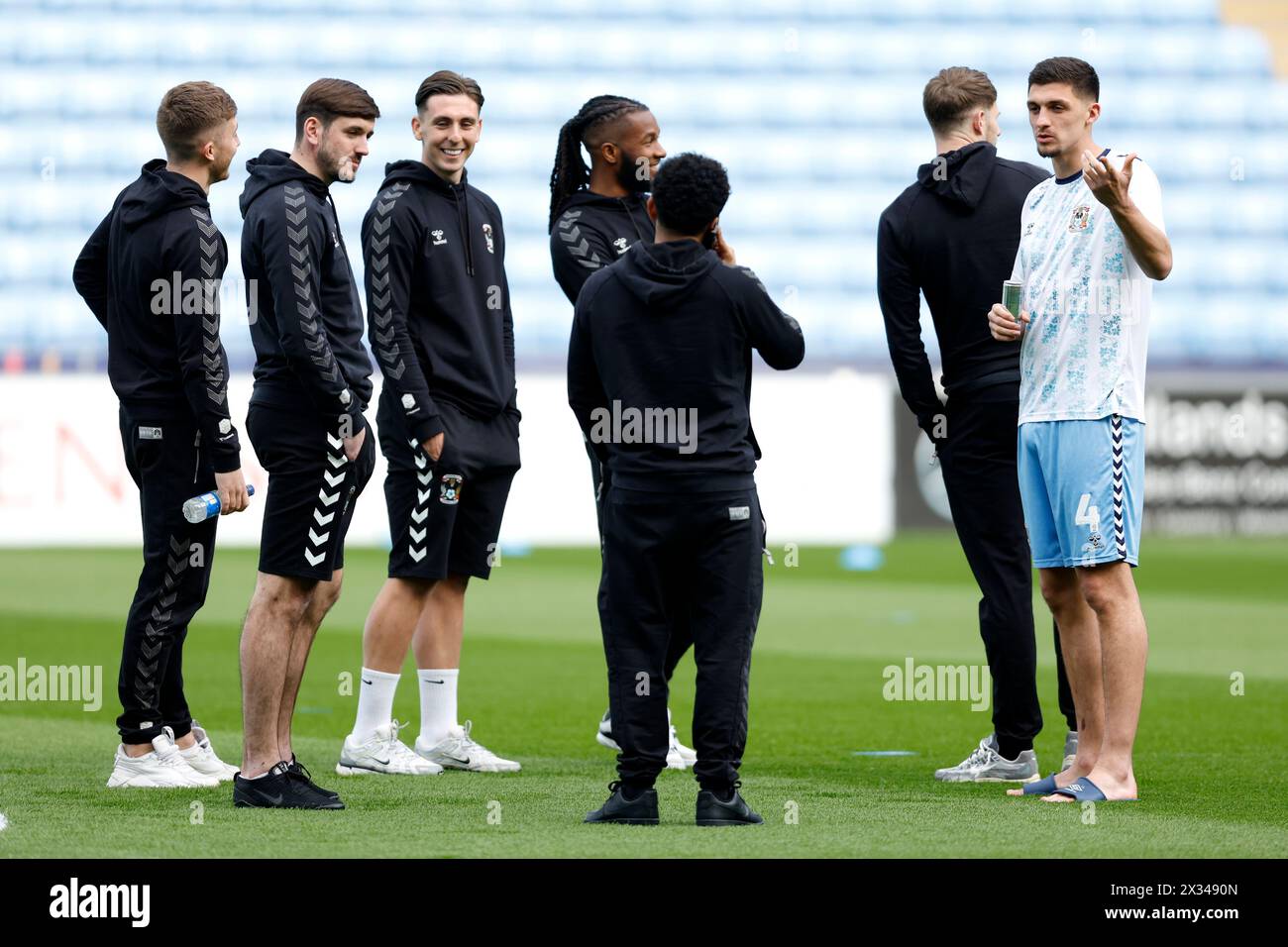Coventry City players inspect the pitch ahead of the Sky Bet Championship match at Coventry Building Society Arena, Coventry. Picture date: Wednesday April 24, 2024. Stock Photo