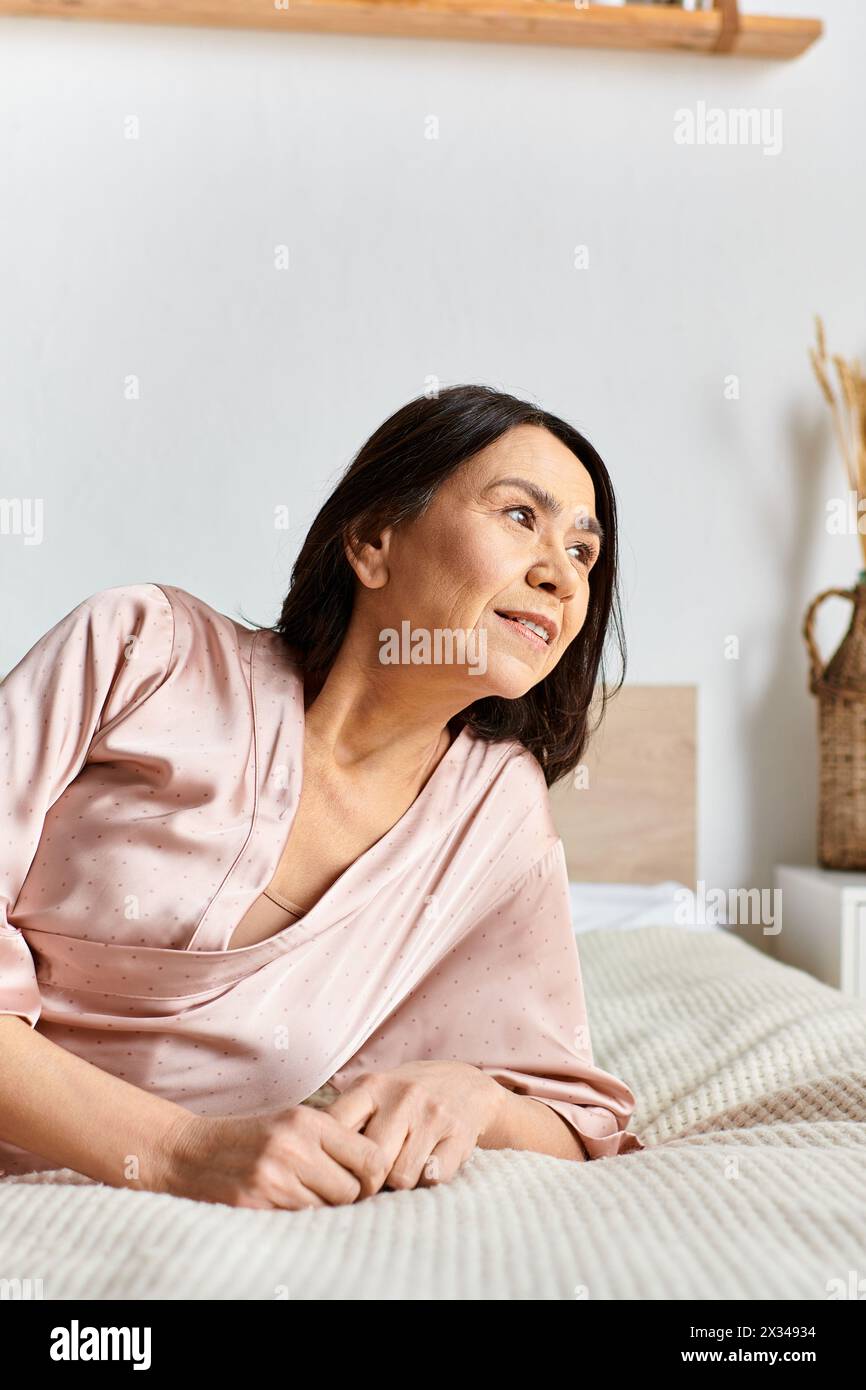 Beautiful mature woman lying on hi-res stock photography and images - Alamy