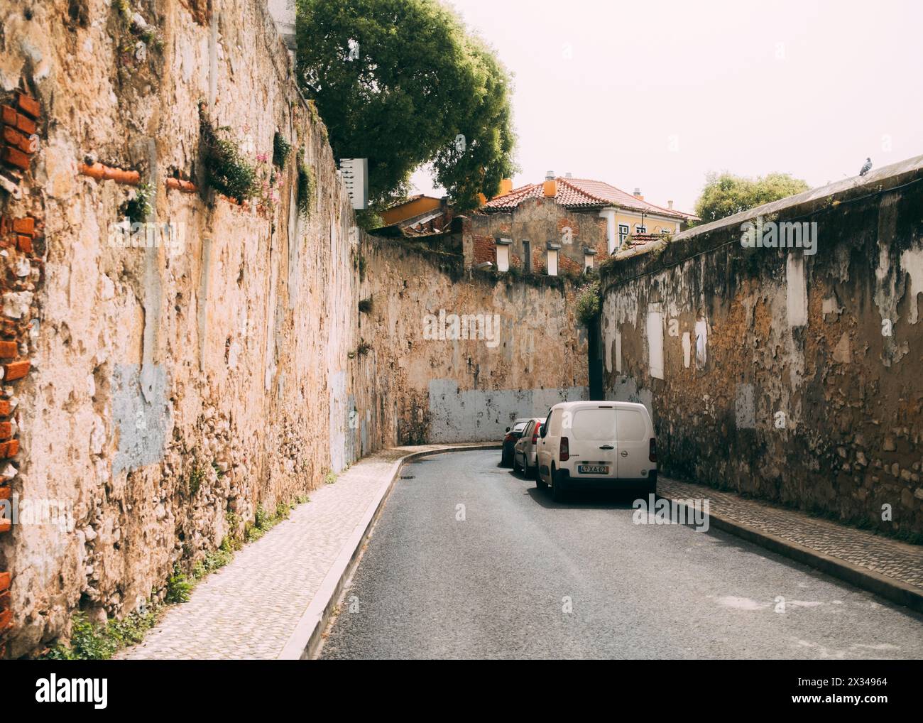 Lisbon, Lissabon, 23.03.2024: Travelpictures Lisbon, Street with old walls. Stock Photo