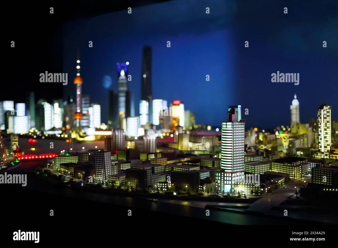 Miniature of modern city with illuminated skyscrapers at night Stock ...