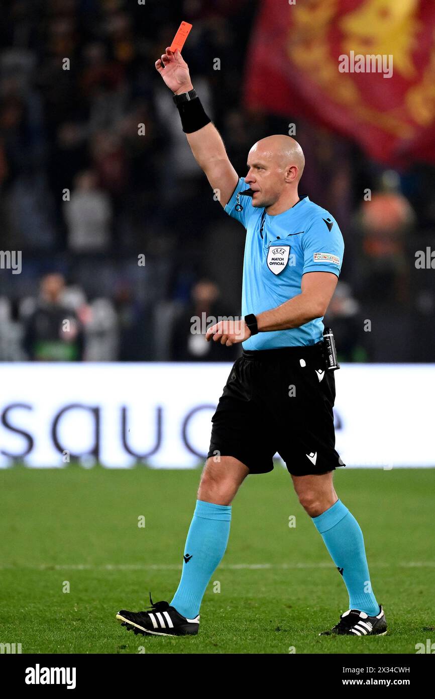 Referee Szymon Marciniak shows a red card during the Europa League football match between AS Roma and AC Milan at Olimpico stadium in Rome (Italy), April 18th, 2024. Stock Photo