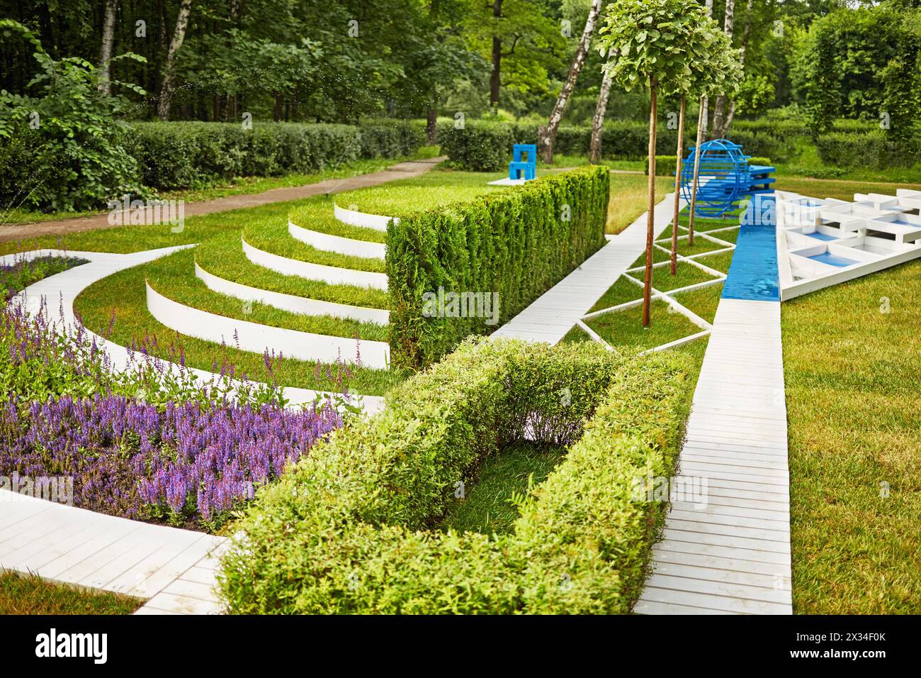 Lawn in summer park, example of landscape disign. Stock Photo