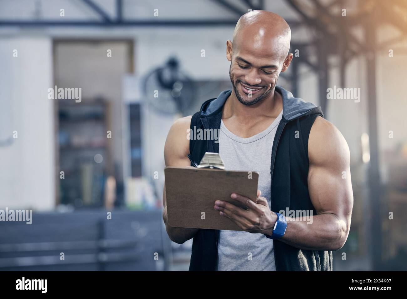 Man, clipboard and sports coach in gym with writing notes for client ...