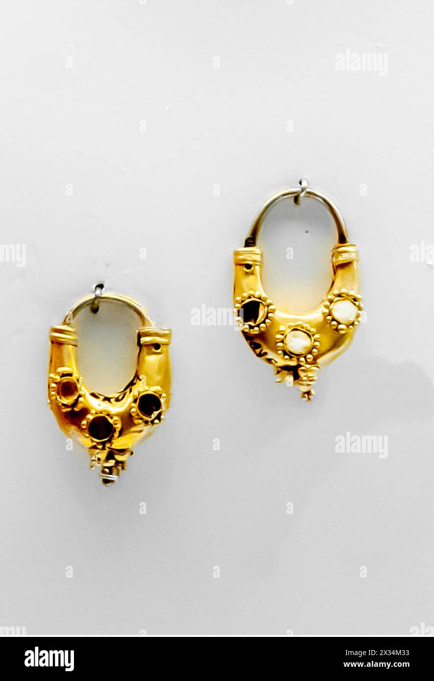 Moon-shaped Gold earrings, 3rd- 2nd century B.C. Lebedevka, West Kazakhstan Stock Photo